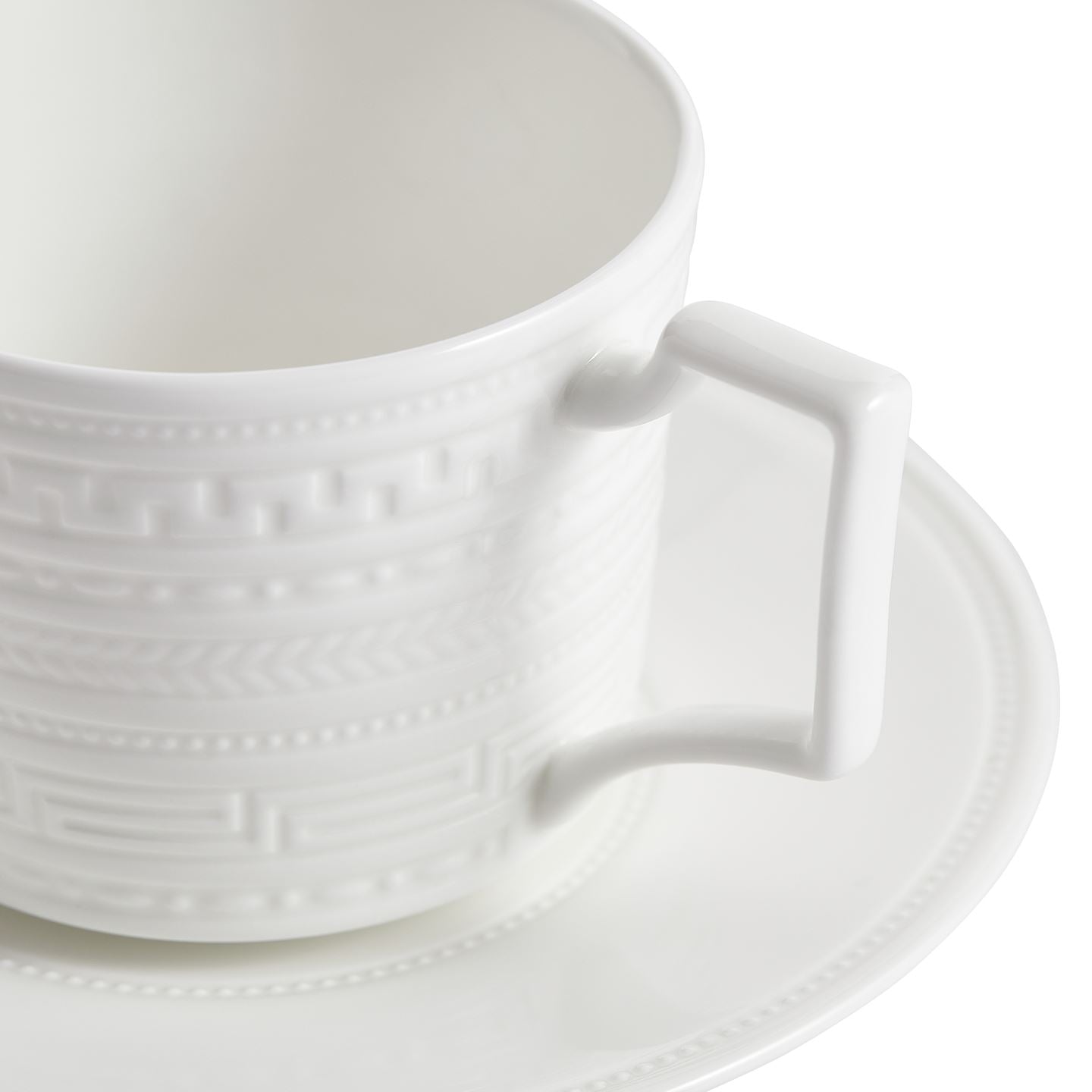 Intaglio Teacup and Saucer